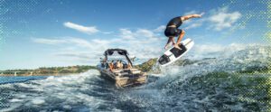 Centurion Ri230 wake boat with surfer behind