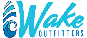 Logo for Wake Outfitters featuring stylized blue waves to the left of the bold, gradient blue brand name, with a subtle nod to ChattaWake 2025 in the design.