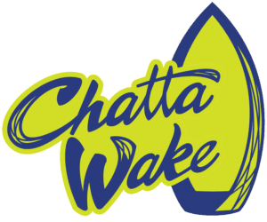 Logo with the words "Chatta Wake" in stylized script next to the outline of a surfboard, using bright yellow and dark blue colors—perfect for ChattaWake 2025.